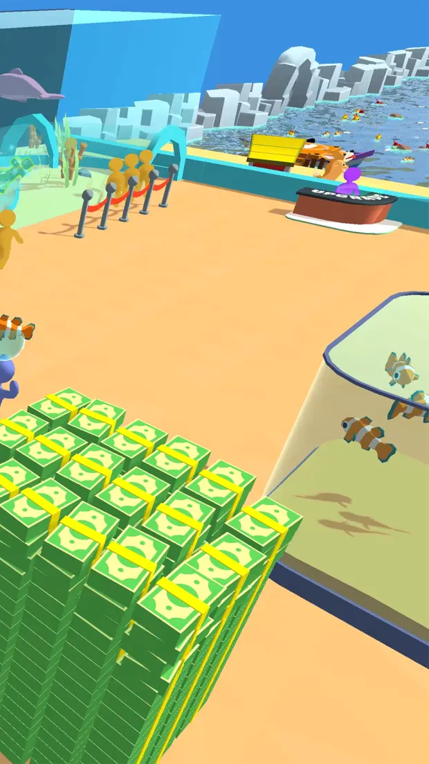 Ecrã do jogo Aquarium Land com peixes coloridos num aquário
